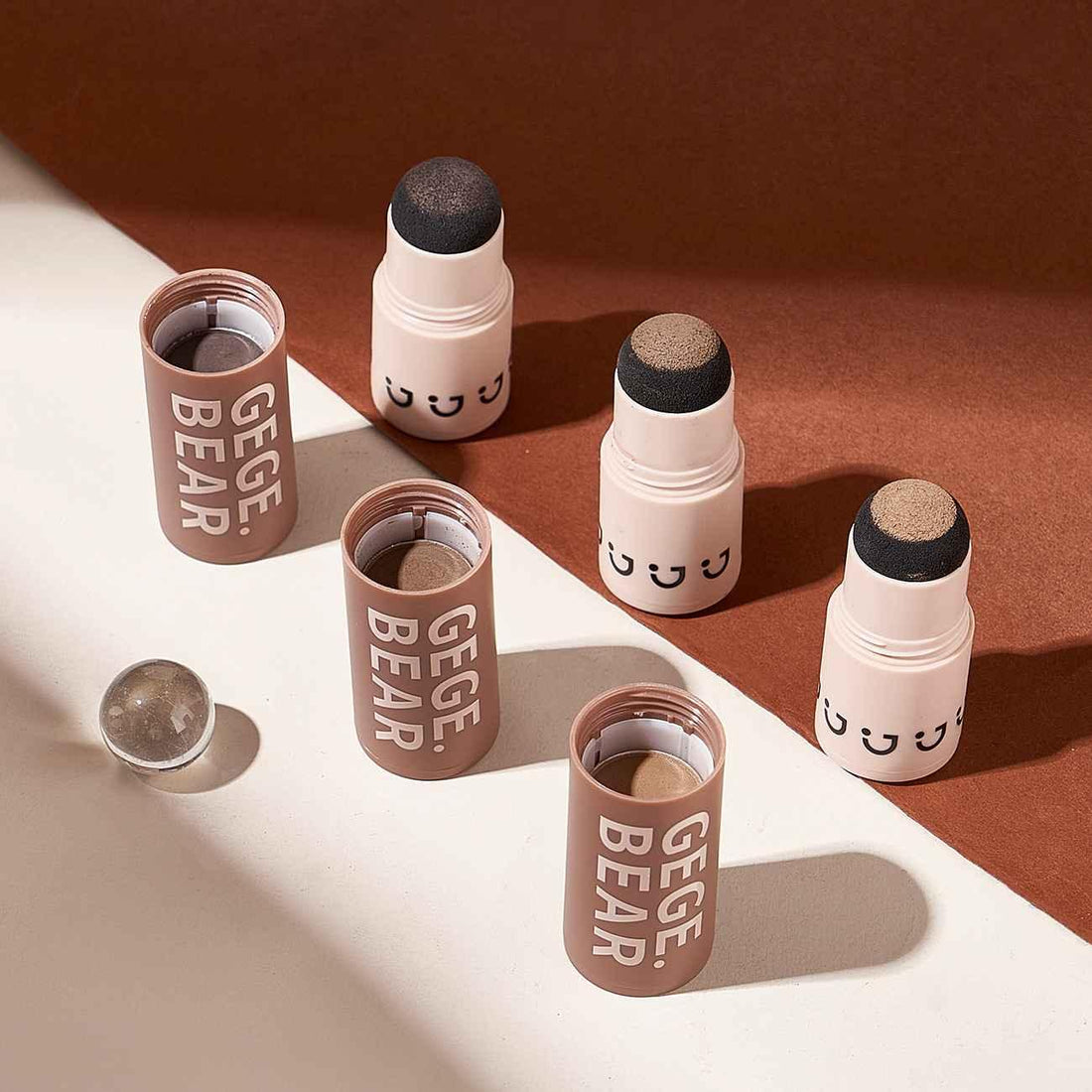 hairline powder 3 shades on a grey and brown background 