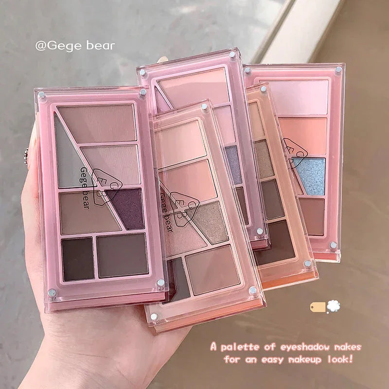 gege bear eyeshadow palette on the hand of a lady