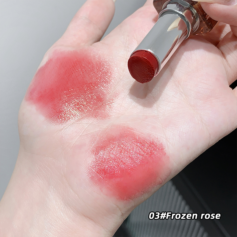 Lipstick swatch on a hand with '03#Frozen rose' color name.