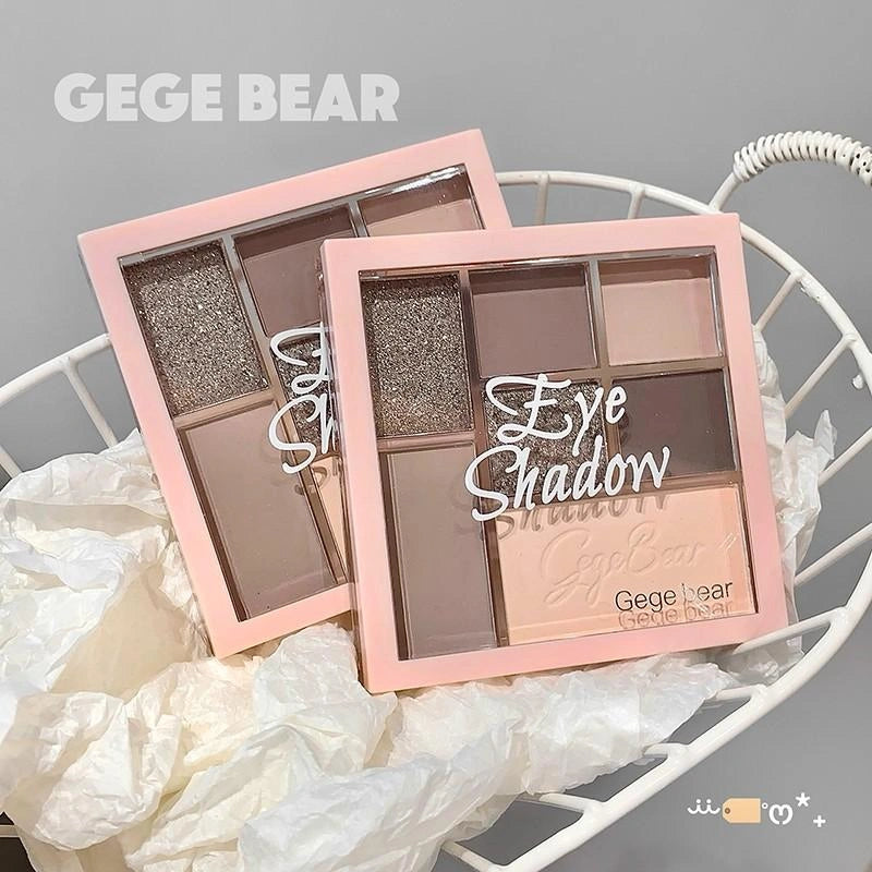 Two eye shadow palettes with 'GEGE BEAR' branding on a decorative background.