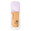 Maybelline Super Stay foundation bottle with purple cap on a white background