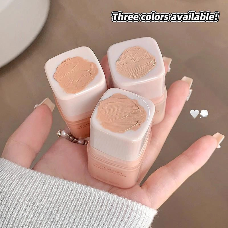 Three matte shades of conealer swatches  on a hand, indicating color options.