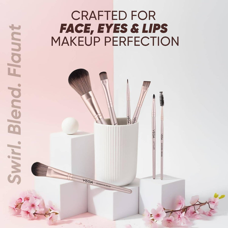 Makeup brushes in a white container with pink flowers on a light background, featuring text about makeup perfection.