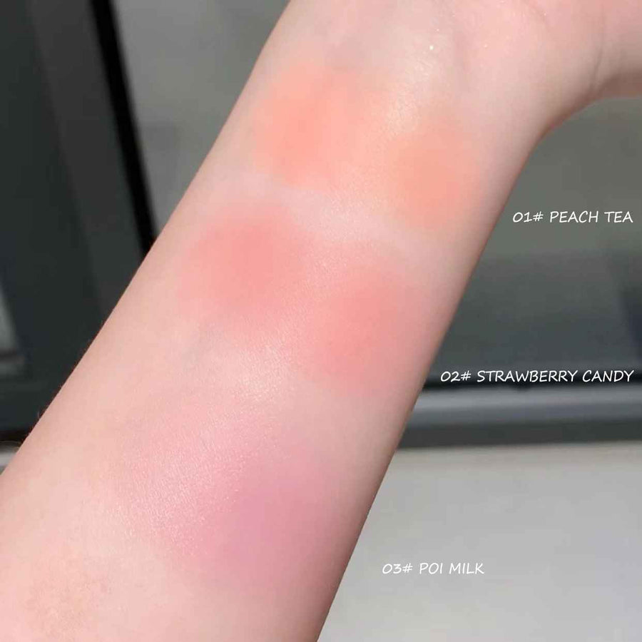Color swatches on a person's arm labeled 'Peach Tea', 'Strawberry Candy', and 'Poi Milk'.