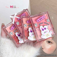 Blush sets with cartoon character design held by a hand