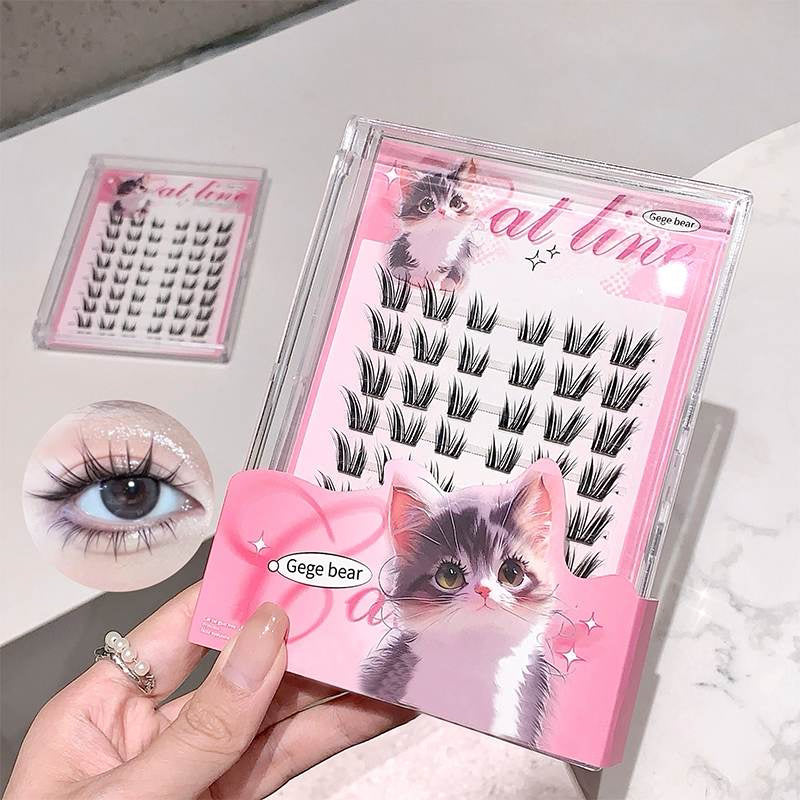 Gege Bear 48 Pieces Cat Line Eyelash Clusters held by a women on a white background 