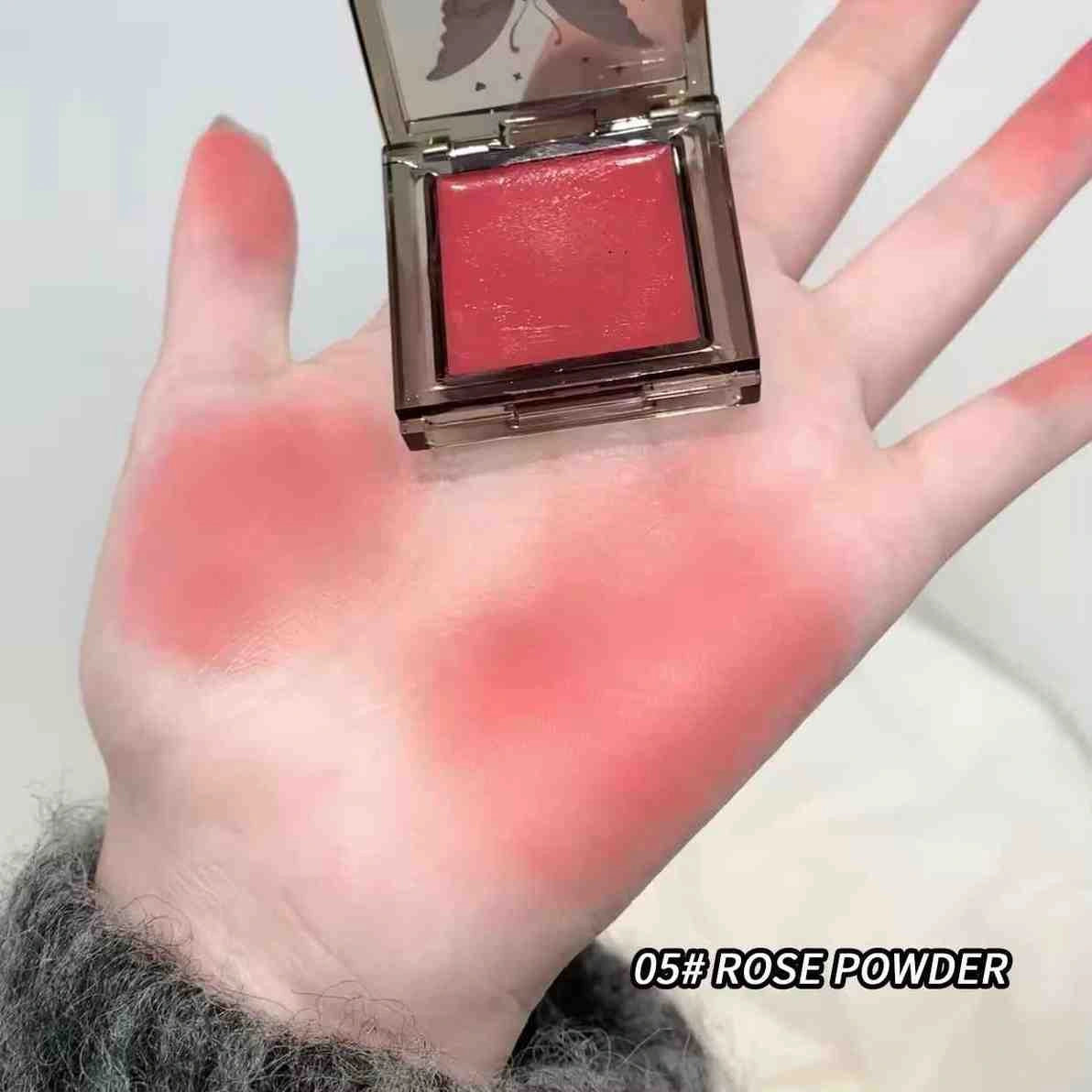 Hand with blush applied, showing color swatch of '05# Rose Powder' on a neutral background.