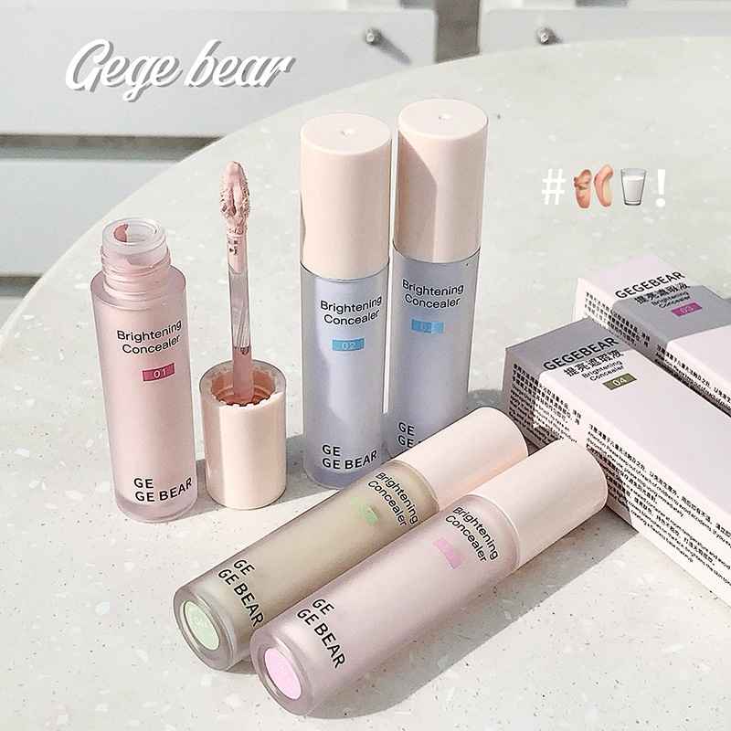 Cosmetic products with 'Gee bear' branding on a light surface.
