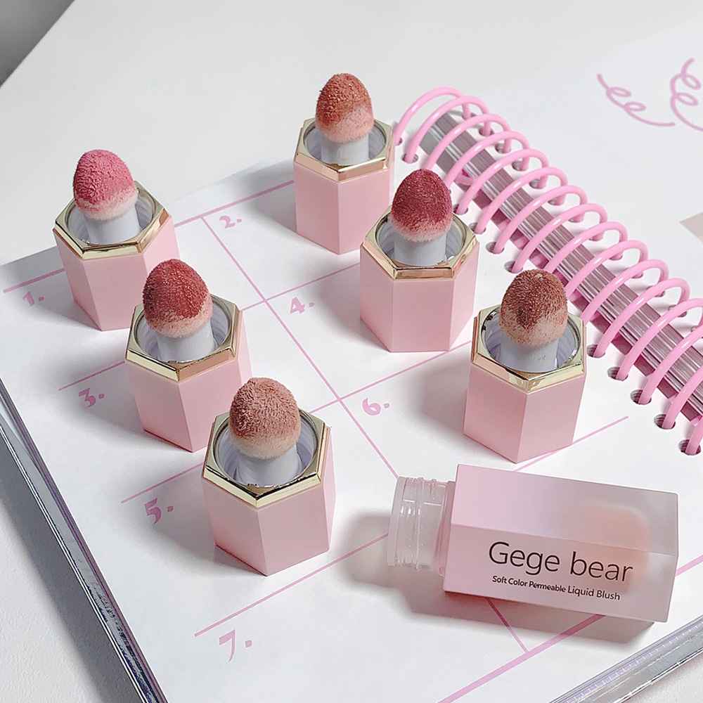 Pink blush with Gege bear branding on a white surface.
