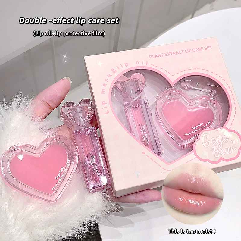 Double-effect lipstick set with heart-shaped lip balm and protective film in a pink box.