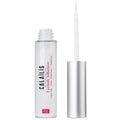 Eyelash adhesive bottle with applicator on a white background