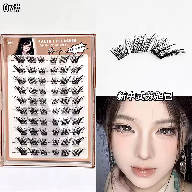 False eyelashe extensions packaging with a sample worn on a person's eye, set against a white background.