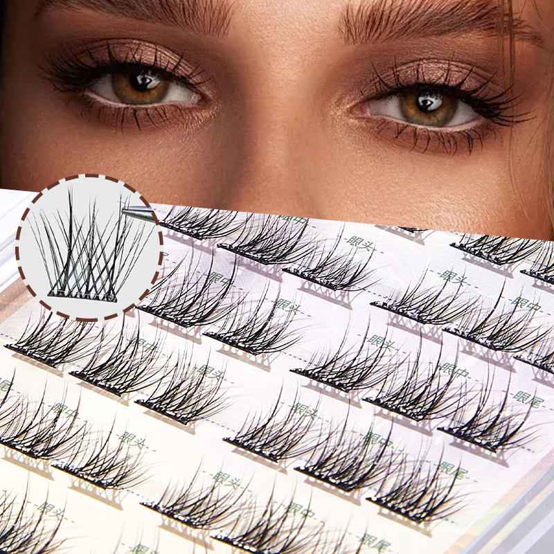 Close-up of false eyelashes with a woman's eyes in the background