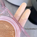 Two fingers holding Gege Bear liquid matte cushion foundation compact, showing product composition, packaging design, and K-beauty inspired cushion formula.