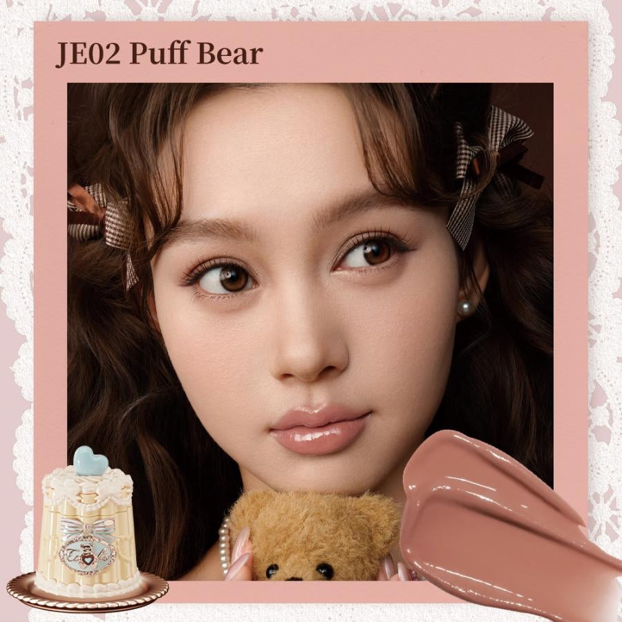 Flowerknows Sweetie Bear Coating Lip Jelly lip gloss in JE02 Puff Bear shade applied on lips showing soft tint and glossy shine effect.