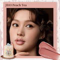 Flowerknows Sweetie Bear Coating Lip Jelly lip gloss in JE03 Peach Tea shade applied on lips showing peach tint and glossy shine effect.