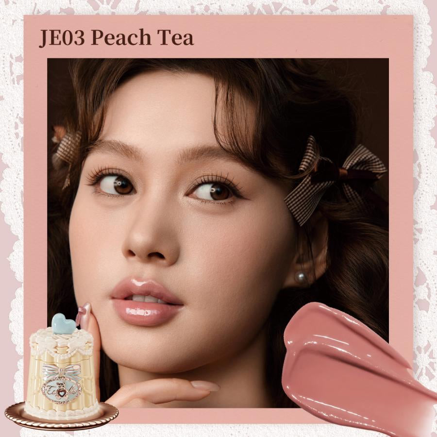 Flowerknows Sweetie Bear Coating Lip Jelly lip gloss in JE03 Peach Tea shade applied on lips showing peach tint and glossy shine effect.