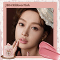 Flowerknows Sweetie Bear Coating Lip Jelly lip gloss in JE04 Ribbon Pink shade applied on lips showing soft pink tint and glossy shine effect.