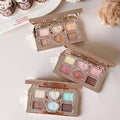 FlowerKnows Sweetie Bear 6-Color Eyeshadow Palette showing all three shades opened on a table with visible matte and shimmer eyeshadow pans in Buttery Croissant, Strawberry Milk, and Mint Chocolate
