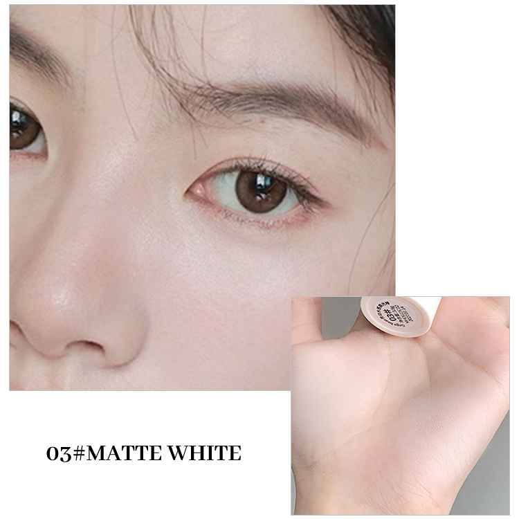 Close-up of an eye with brown iris and eyelashes, showing a product labeled '03# Matte White' on a white background.