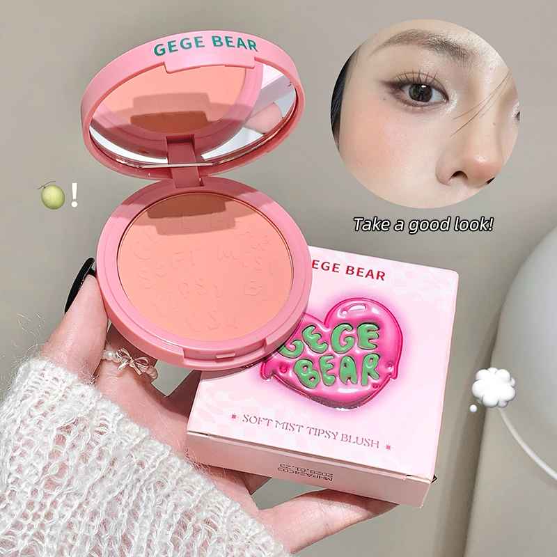 Pink blush compact with 'GEGE BEAR' branding and a close-up of a person wearing it.