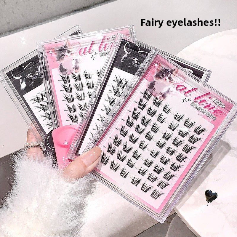 Hand Holding Gege Bear Cat Tie Glue Free Lashes 48pcs pack displaying wispy eyelash clusters on a white background