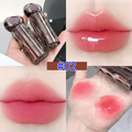 Lips gloss with packaging, applied on lips, and swatches on skin.