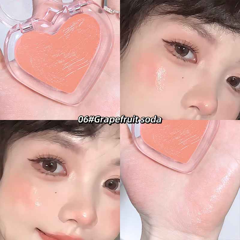 Heart-shaped blush compact with a close-up of a person wearing it on their cheek, labeled '06# Grapefruit soda'.