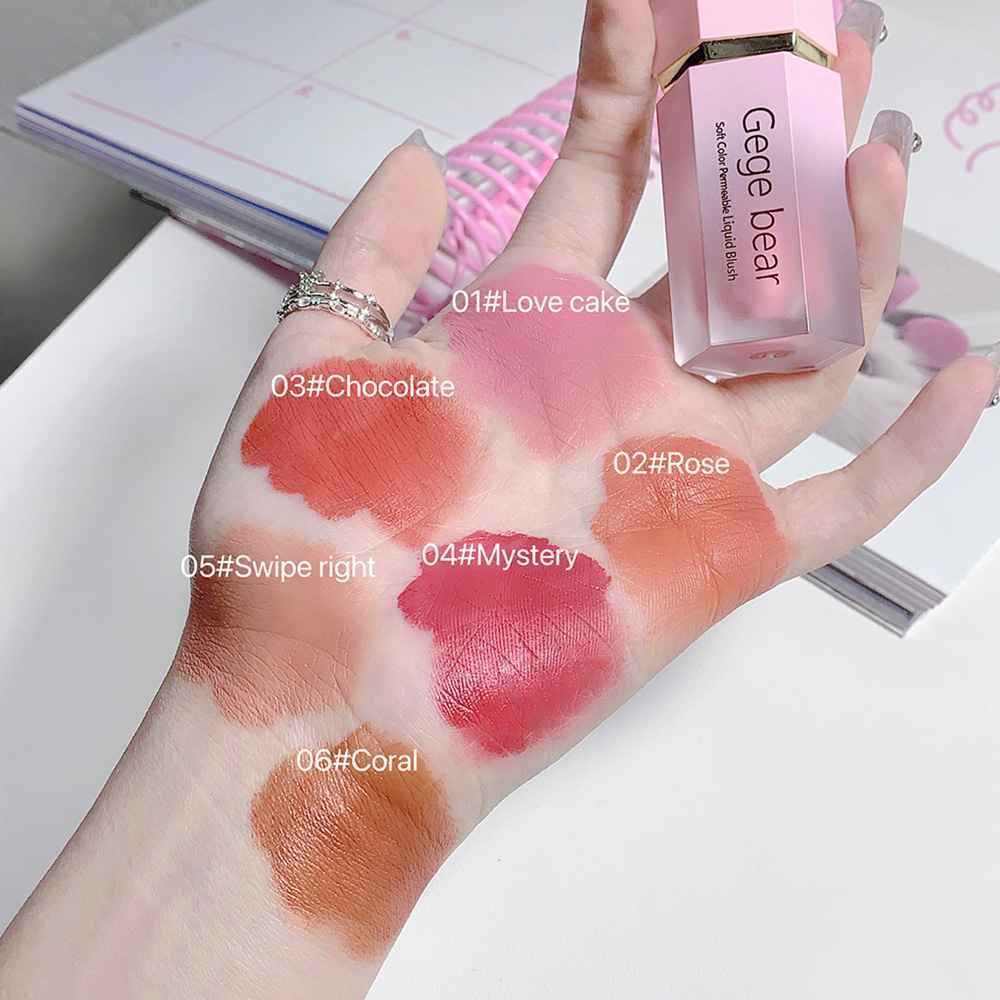 Hand with blush swatches labeled and 'Gege bear' product in the background