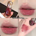 Lip Gloss with 'Gege Bear' branding, applied on lips and swatched on skin.