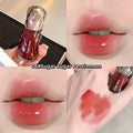 Lip gloss with 'Gege Bear' branding, shown on lips and swatched on skin in red shades 
