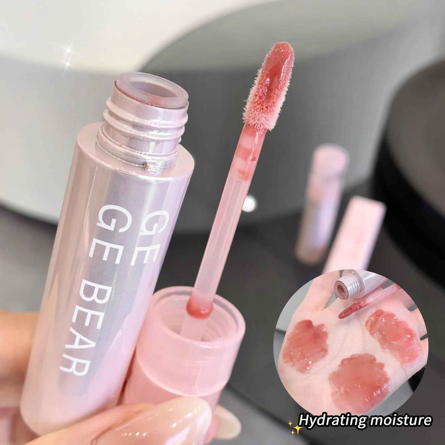 Lip gloss with applicator and 'GEGE BEAR' branding, showing hydrating moisture effect.