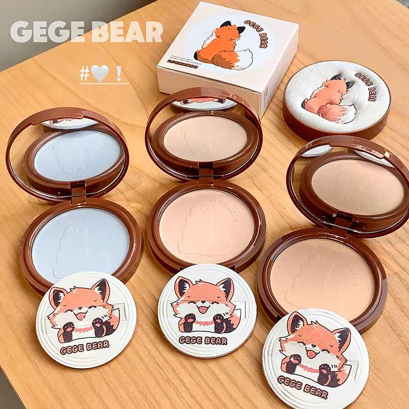 Makeup compacts with cartoon fox design on lids and GEUGE BEAR branding.