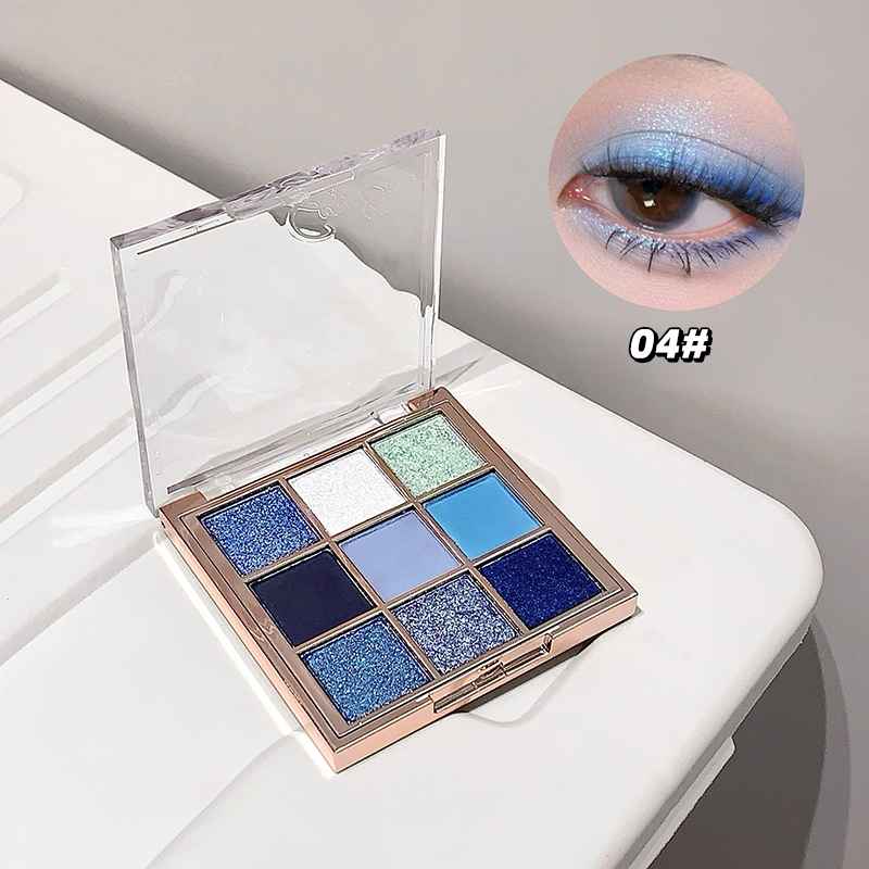 Makeup palette with blue shades and an inset of an eye wearing the makeup.