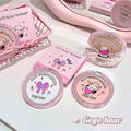 Makeup products with 'Gege bear' branding on a light pink background