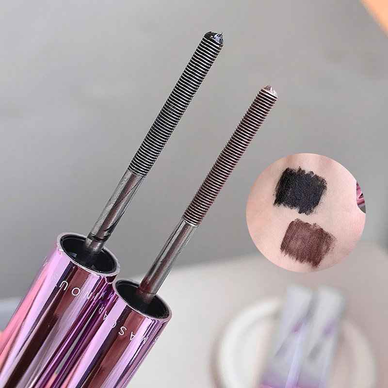 Mascara with pink casings and close-up of color swatches on a neutral background