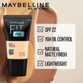 Maybelline Fit Me foundation tube with product features on a beige background
