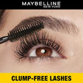 Maybelline New York mascara brush applying eyelashes with 'Clump-Free Lashes' text.