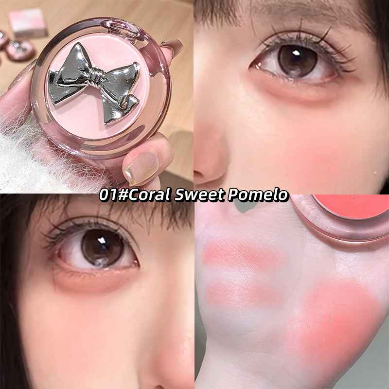 Makeup product with a bow design, applied to skin showing color swatches.