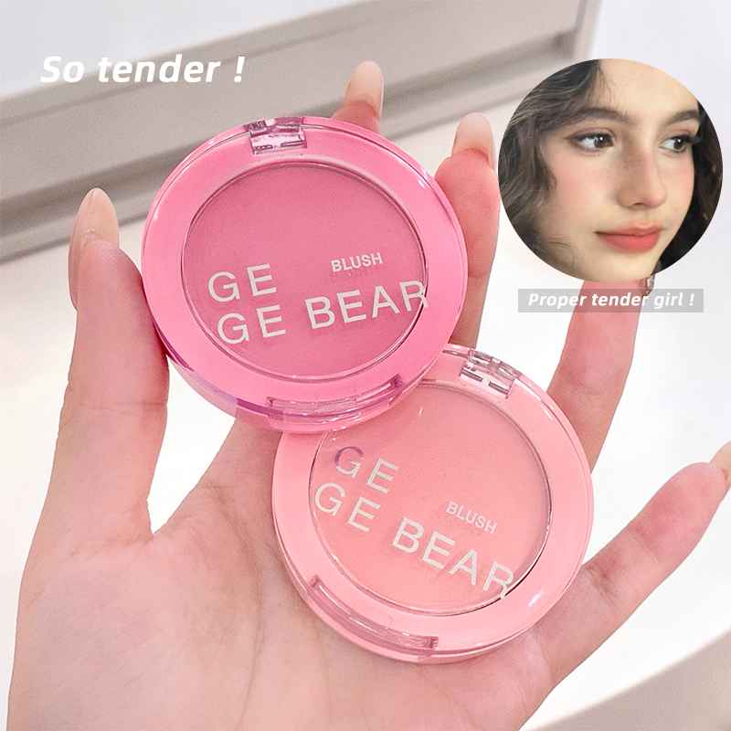 Pink blush compact with 'GEGE BEAR' branding held in a hand, with a close-up of a person wearing the blush.
