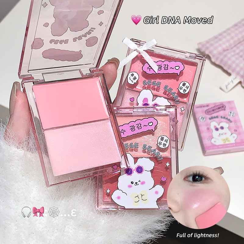 Pink makeup product with cartoon character packaging on a white background