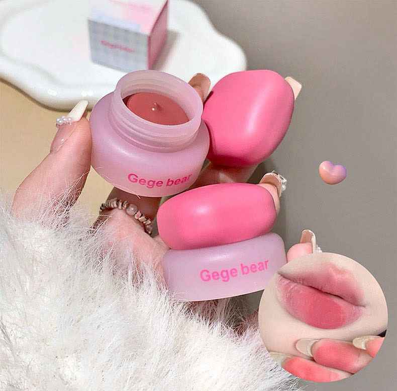 Pink blush with 'Gege bear' branding held by a hand against a neutral background.