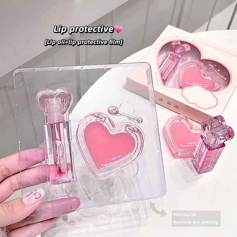 Pink lipstick and protective film with heart design in clear packaging.