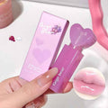 Purple lip balm with heart design and 'Gege bear' branding, held by a hand.