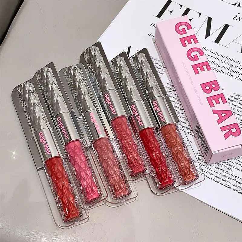 Set of GEGE BEAR lip glosses on a magazine background
