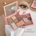 Makeup palette with eyeshadow shades and a close-up of an eye wearing the product.