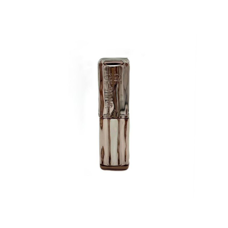 Silver lipstick on a white background