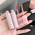 Three lip products with a pink shade held in a hand, branded 'gege bear'.