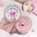 Two containers of 'Soft Focus Powder' with cartoon designs on a light pink background.