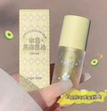 Crystal jelly lip oil with packaging held by a hand, featuring Gege bear branding with avocado flavours